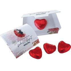 Lettre publicitaire, coeur en chocolat au lait rouge