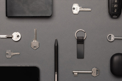 Porte-clés luxe en PU et alliage de zinc recyclé RCS